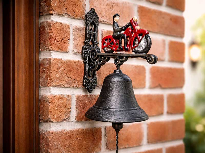 Kleine Wandglocke "Motorrad mit Biker" Gusseisen farbig lackiert